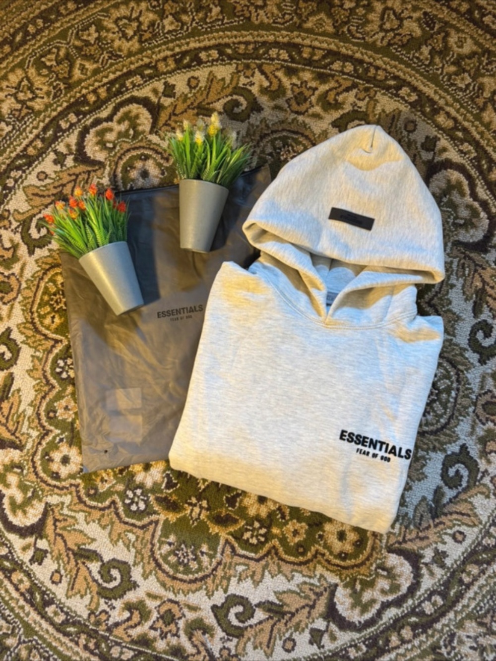 **Extra small**New essentials hoodie with dust bag and tags